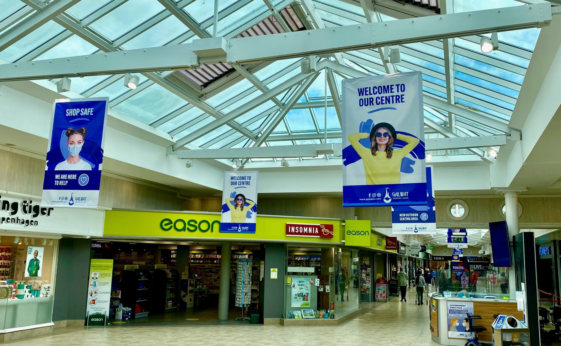 Internal ceiling hanging signs for shopping centres